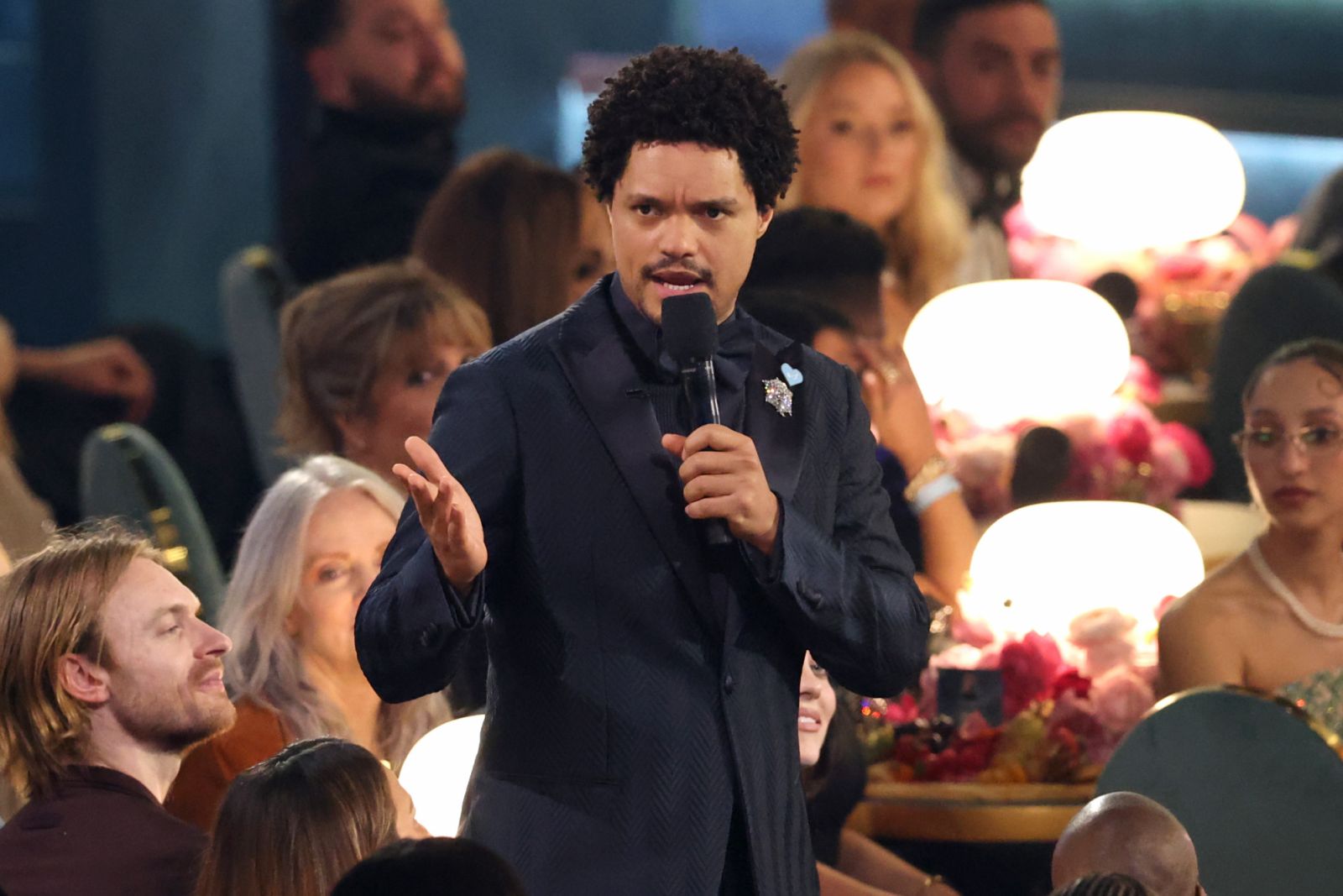 LOS ANGELES, CALIFORNIA - FEBRUARY 02: Trevor Noah speaks onstage during the 67th GRAMMY Awards at Crypto.com Arena on February 02, 2025 in Los Angeles, California. (Photo by Amy Sussman/Getty Images)