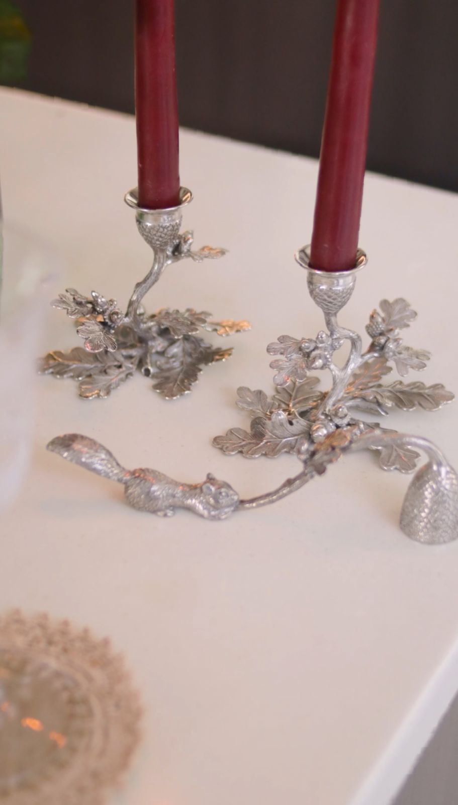 Silver ornamental candleholders from a Parisian flea market