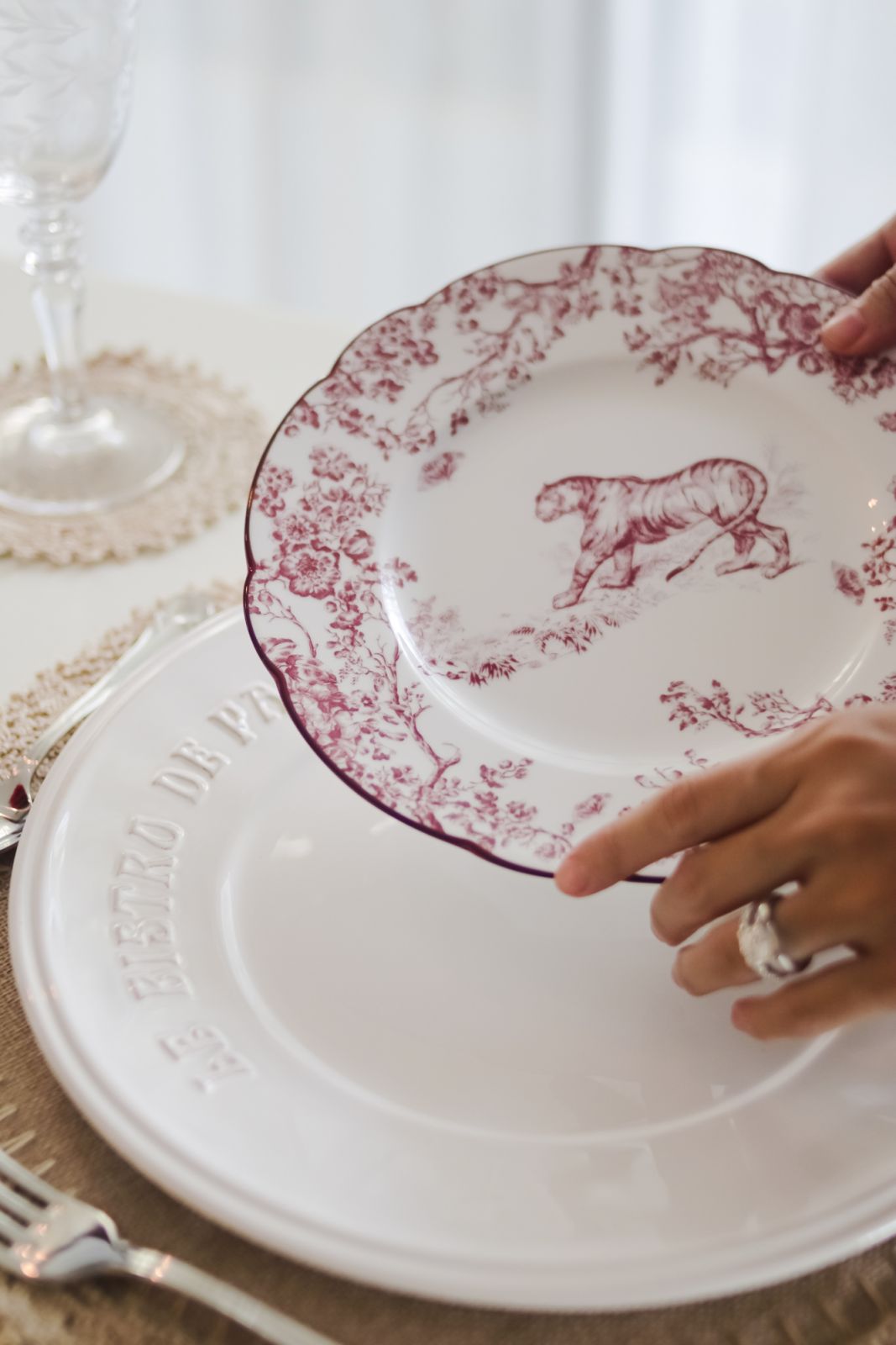 Vintage-inspired toile salad plates from Dior and heirloom dinner plates