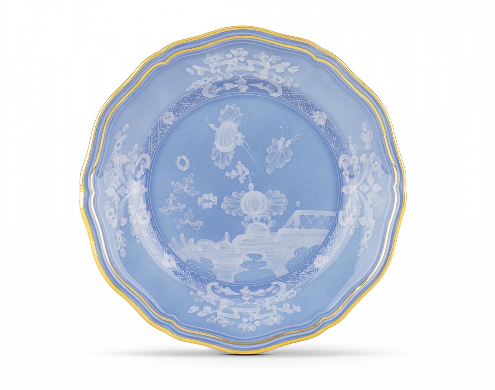 Porcelain bread plates with periwinkle blue decoration from the Oriente Italiano collection (Photo: Ginori 1735 Website)