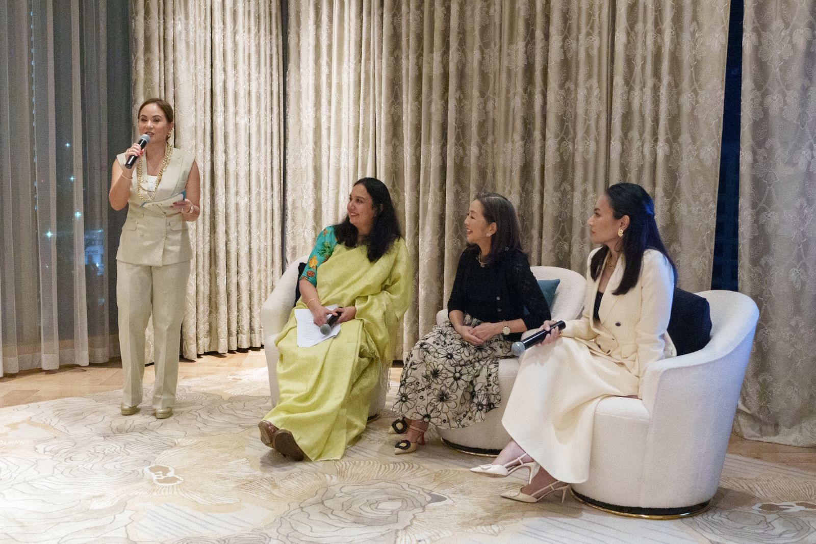 Aziza Mondoñedo leading the fireside chat between Naina Subberwal Batra, Mercedes Lopez Vargas and Usec Emmeline Villar