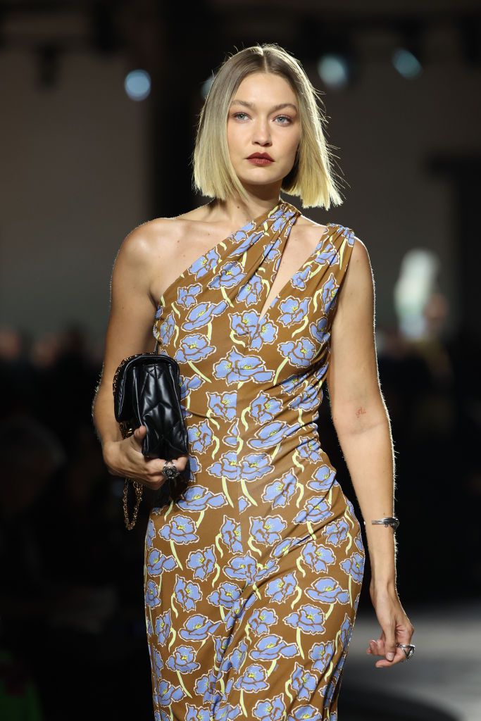 MILAN, ITALY - SEPTEMBER 20: Gigi Hadid walks the runway at the Versace fashion show during the Milan Womenswear Spring/Summer 2025 on September 20, 2024 in Milan, Italy. (Photo by Daniele Venturelli/WireImage)
