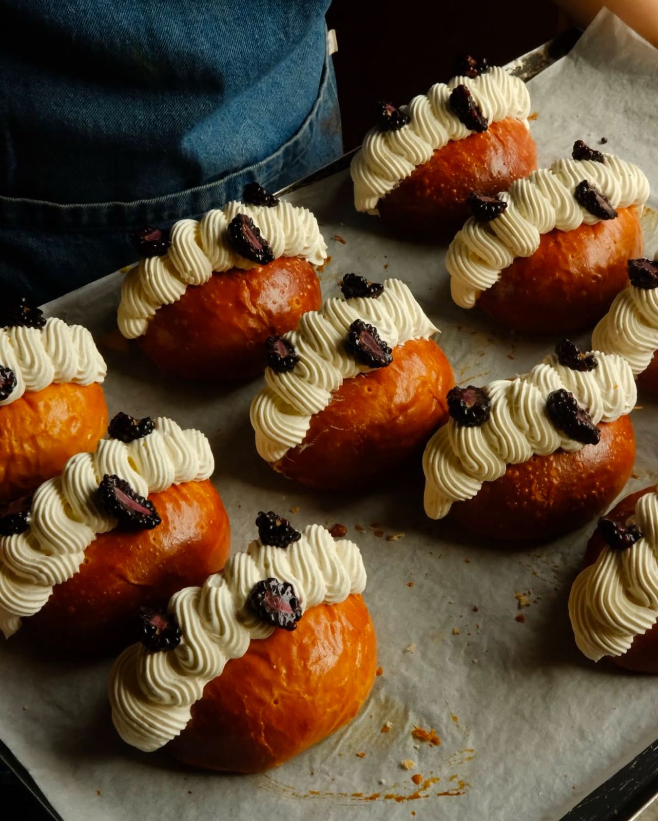 Vanilla cream brioche buns with passionfruit curd and blackberries (Photo: Instagram/ @motherdoughbakery)
