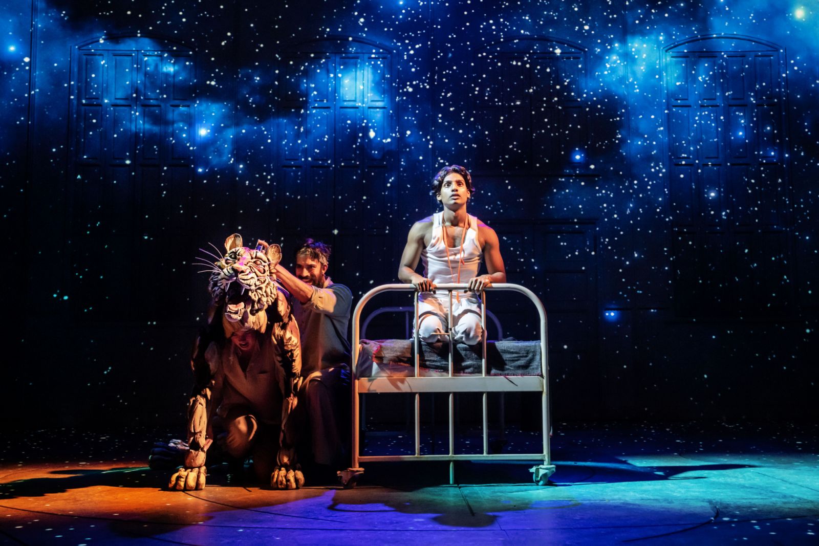 LIFE OF PI by Martel, Novelist-Yann Martel, Playwright-Lolita Chakrabarti, Director -Max Webster, Set and Costume Designer - Tim Hatley, Puppetry and Movement Director - Finn Caldwell, Puppet Designers - Nick Barnes & Finn Caldwell, Video Designer - Andrzej Goulding, Lighting Designer -Tim Lutkin, Sound Designer -Carolyn Downing, Composer - Andrew T. Mackay, Dramaturg-Jack Bradley, Sheffield Theatres,Tour 2023, UK, Credit: Johan Persson/