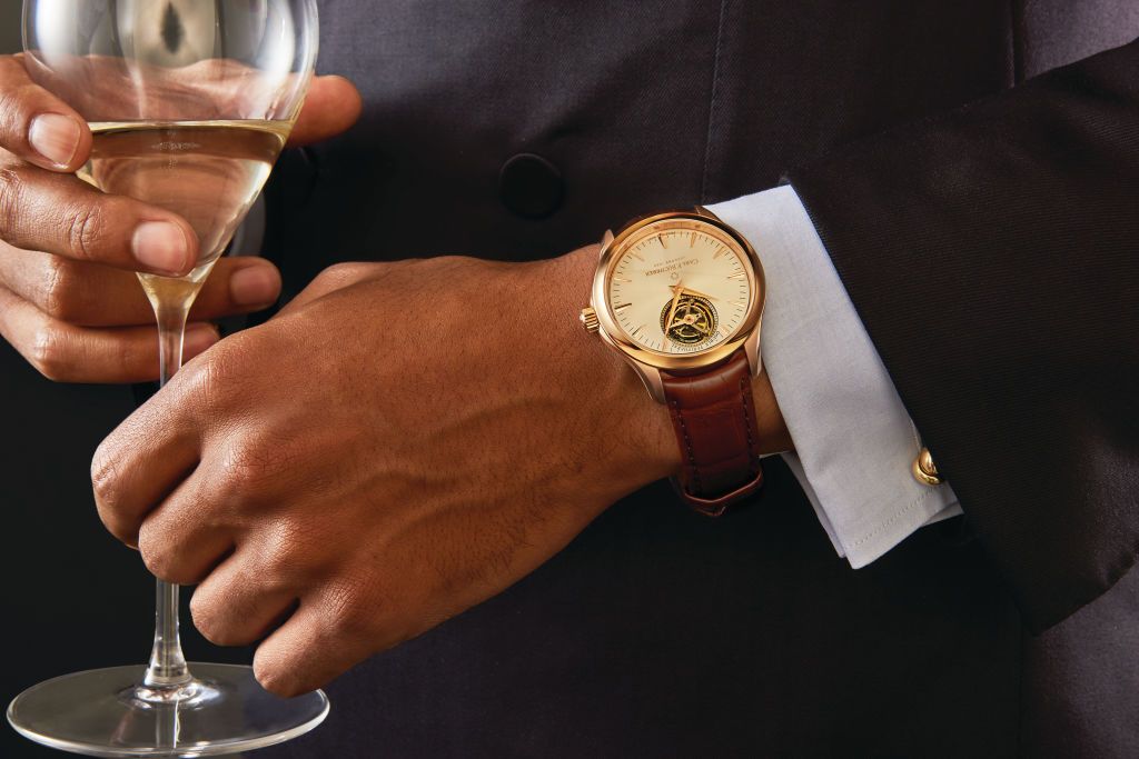 Carl F. Bucherer Manero Tourbillon Double Peripheral in 18-karat rose gold; Giorgio Armani wool tuxedo; Canali cotton dress shirt; Cartier cuff links in 18-karat white, yellow and rose gold. (Photo by Joshua Scott/Robb Report/Penske Media via Getty Images)