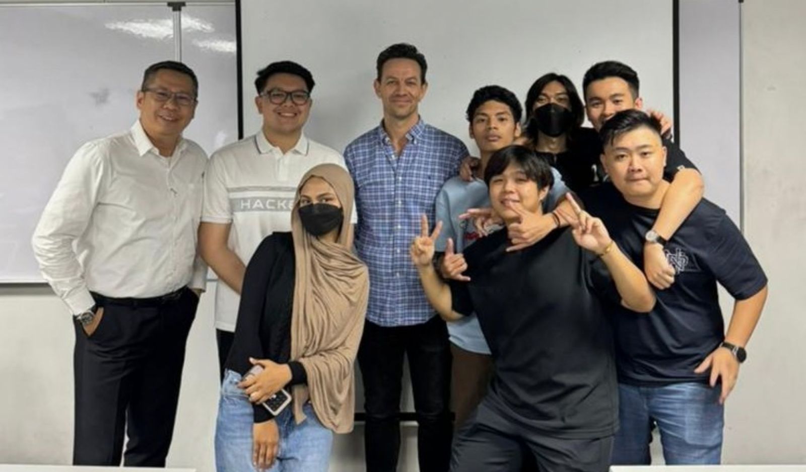 Wan Muhammad Bin Wan Sa’adi together with his fellow classmates post attending an insightful talk by a German entrepreneur, invited by Mr Yip