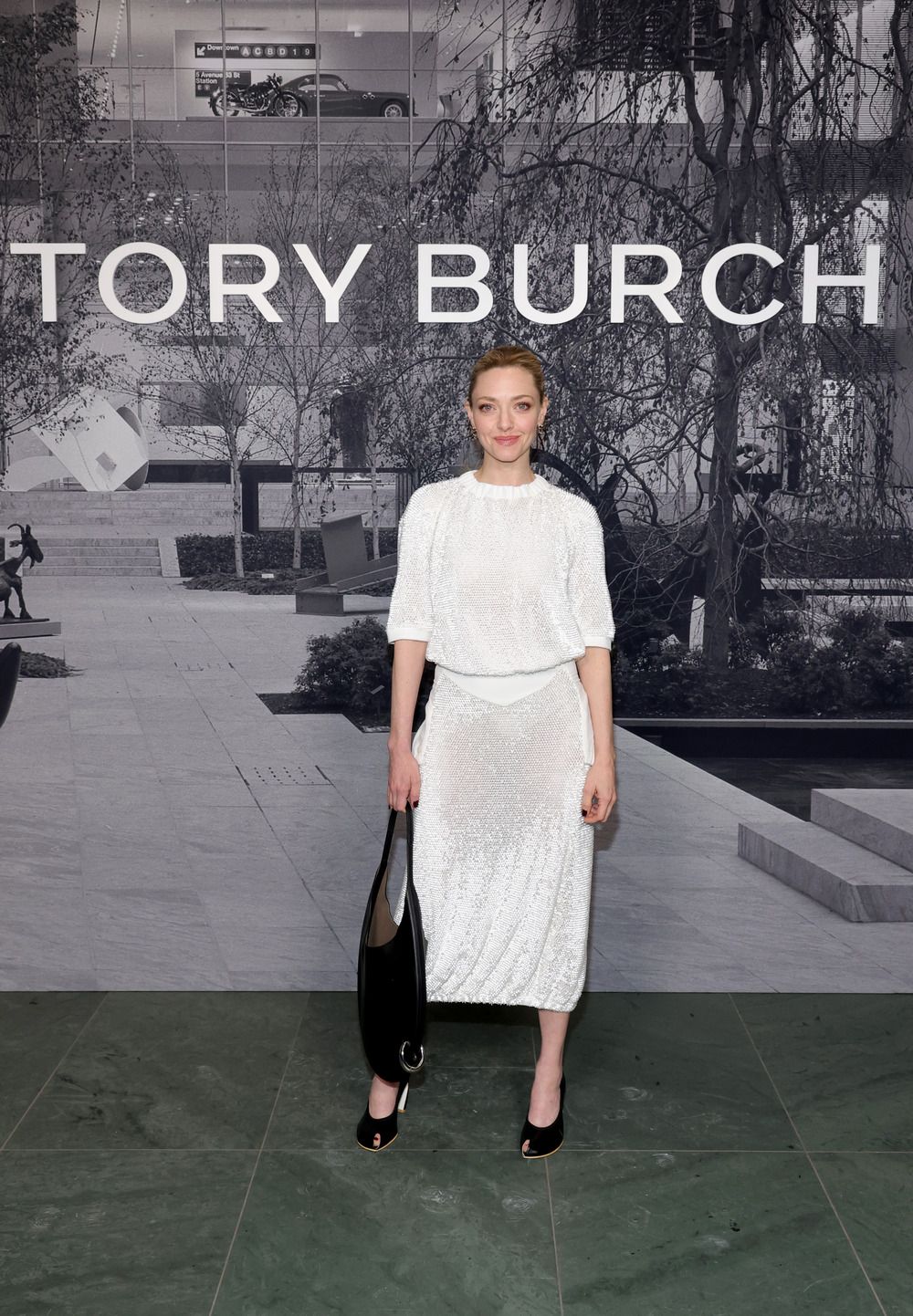 NEW YORK, NEW YORK - FEBRUARY 10: Amanda Seyfried attends Tory Burch Fall/Winter 2025 during New York Fashion Week at MOMA on February 10, 2025 in New York City. (Photo by Dimitrios Kambouris/Getty Images for Tory Burch)