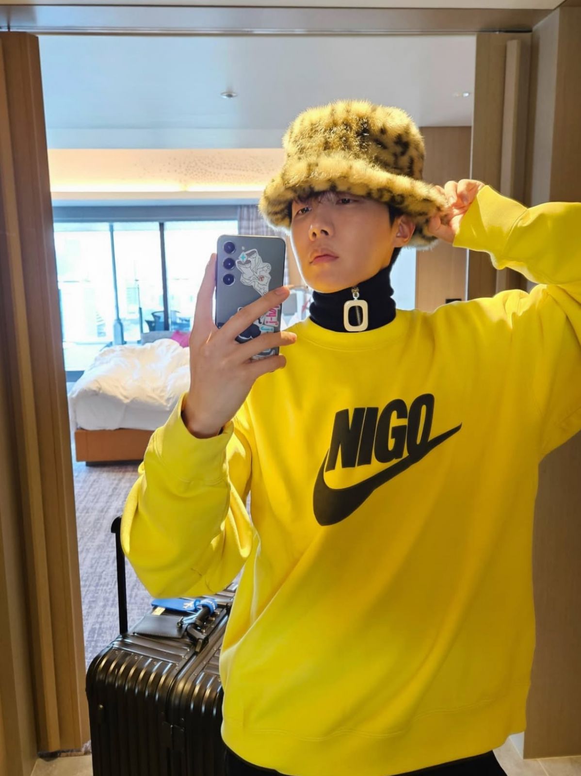 j-hope wearing a Nike x Nigo Apparel Crew Neck Sweatshirt (Photo: j-hope / Instagram)