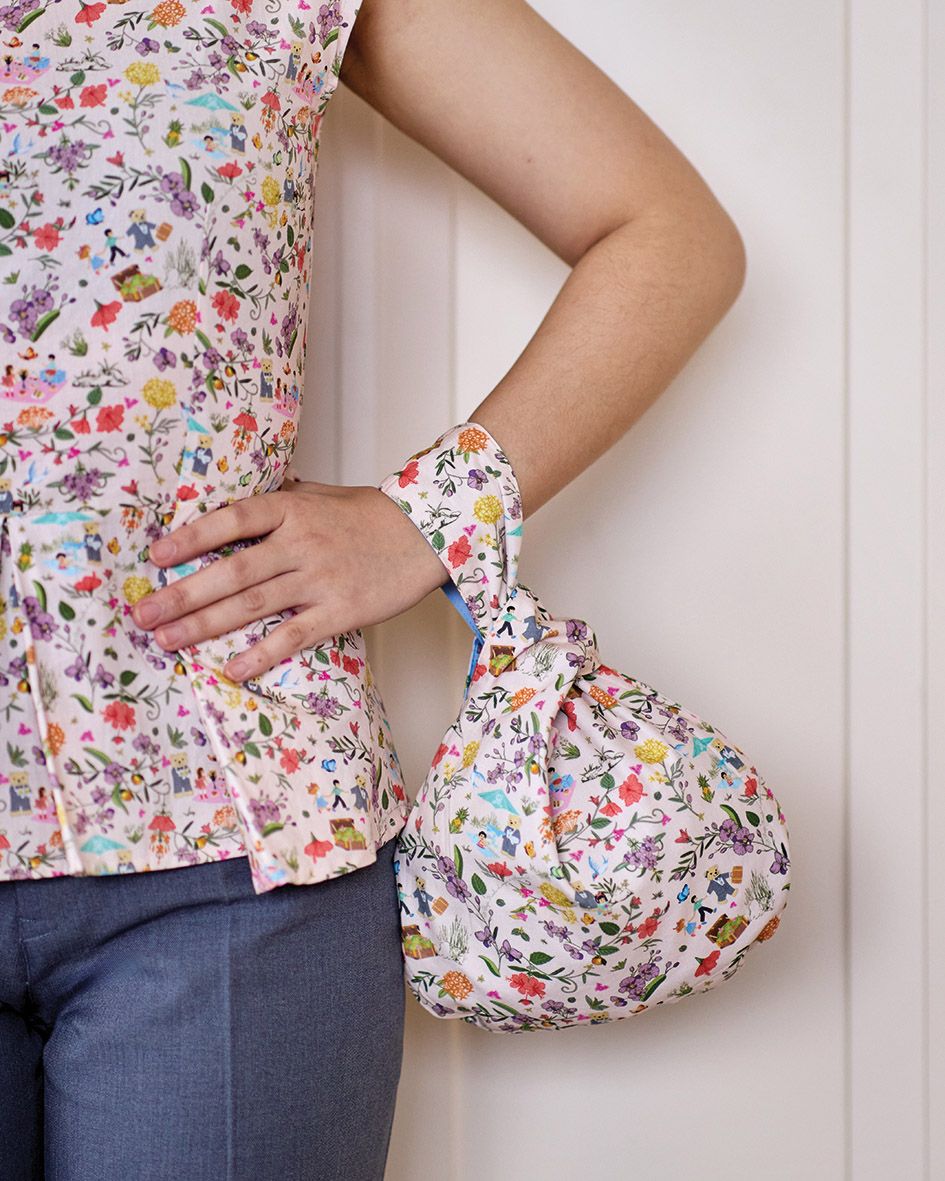 The collection includes outfits for adults and pouches