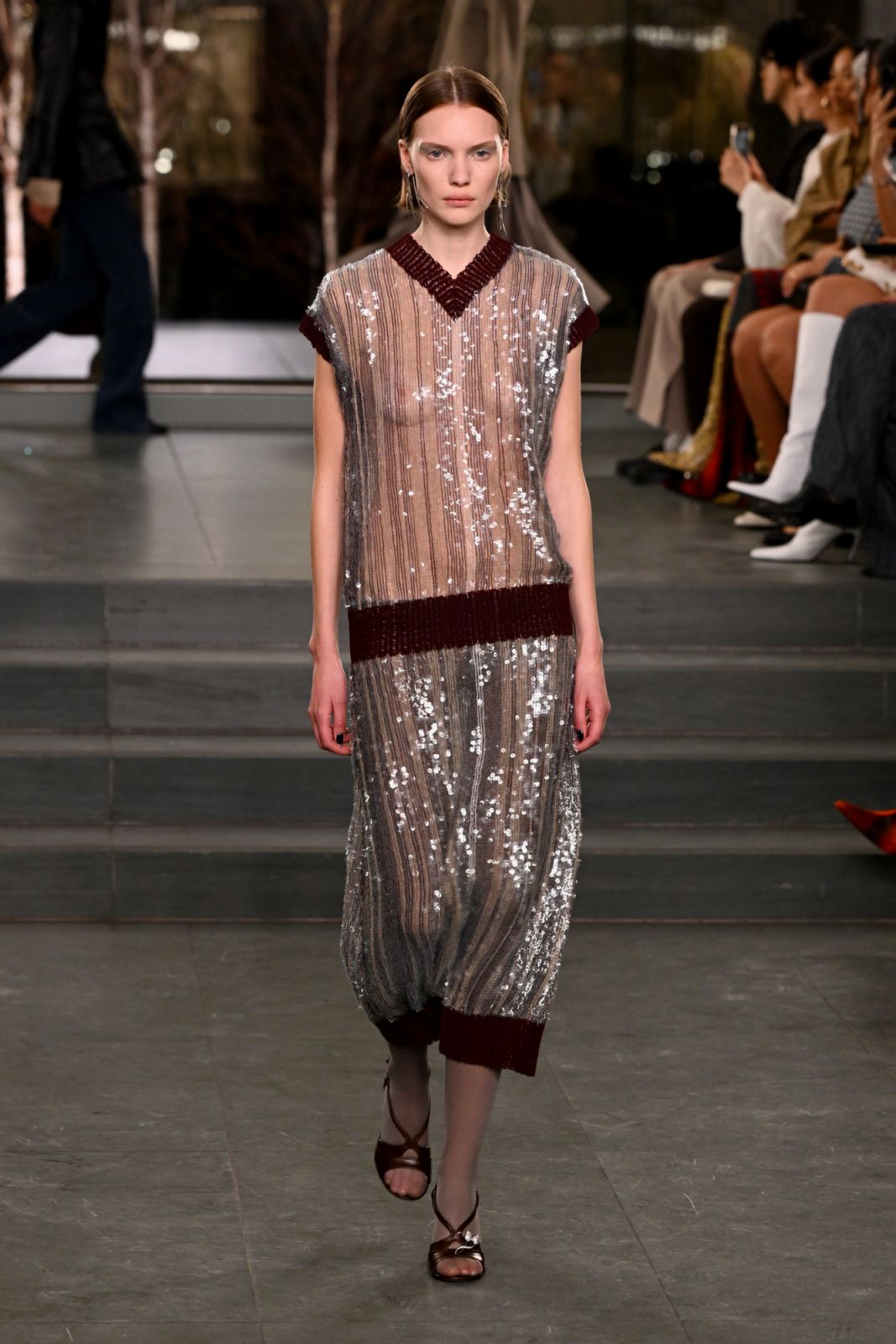 NEW YORK, NEW YORK - FEBRUARY 10: (EDITOR’S NOTE: image contains partial nudity) A model walks the runway wearing Tory Burch Fall/Winter 2025 during New York Fashion Week at MOMA on February 10, 2025 in New York City. (Photo by Slaven Vlasic/Getty Images for Tory Burch)