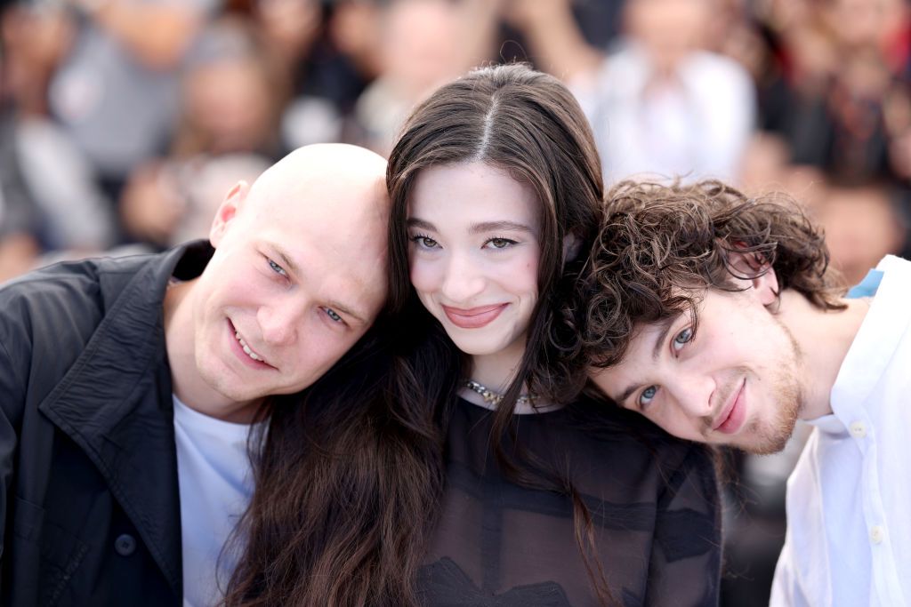 CANNES, FRANCE - MAY 22: (L-R) Jurij Borisov, Mikey Madison and Mark Eydelshteyn attend the "Anora" Photocall at the 77th annual Cannes Film Festival at Palais des Festivals on May 22, 2024 in Cannes, France. (Photo by Pascal Le Segretain/Getty Images)