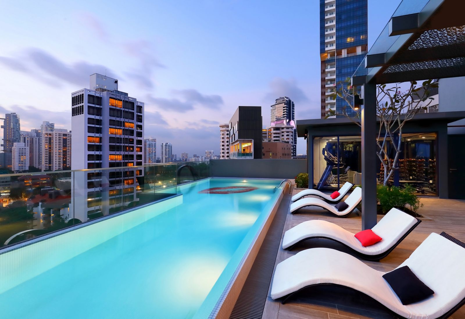 Relaxing areas by the rooftop swimming pool