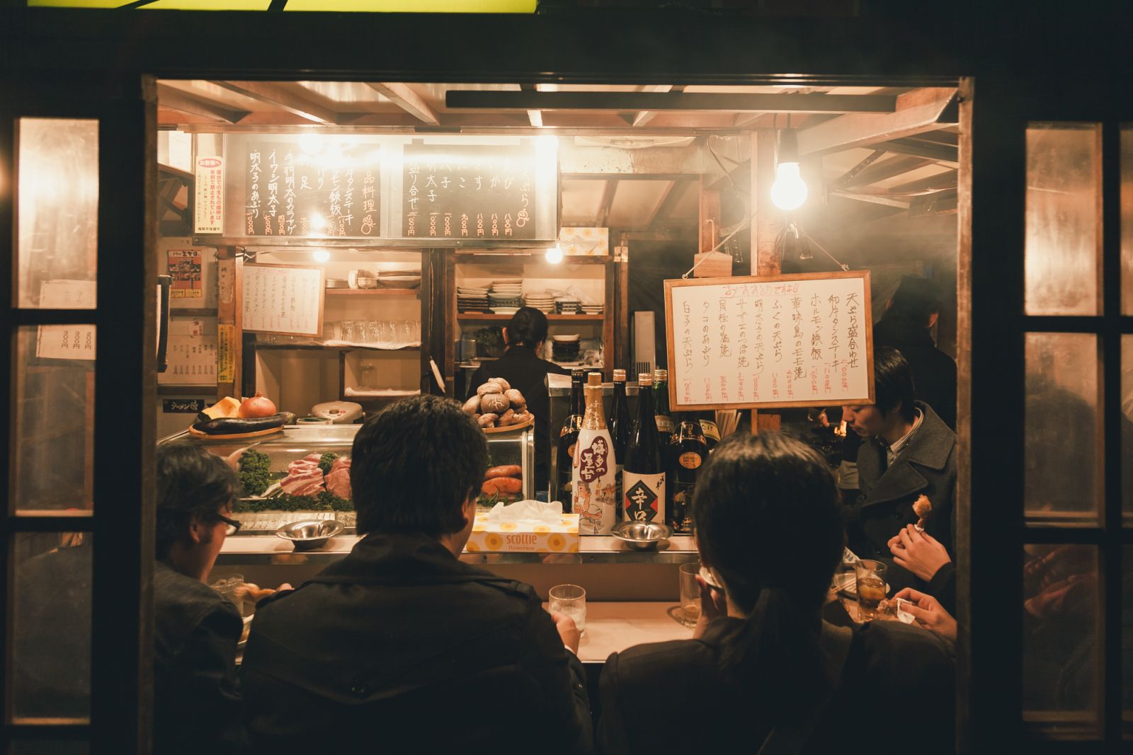 FUKUOKA, JAPAN - MAR 3, 2012 : Yatai Fukuoka's open air food stands food stall Street food with crowd people city nightlife