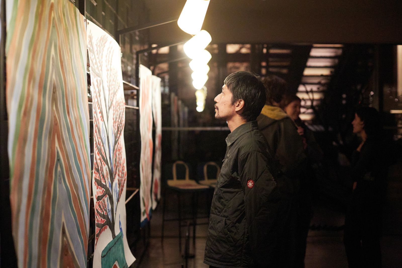 Admiring the art showcased at Ace Hotel Kyoto