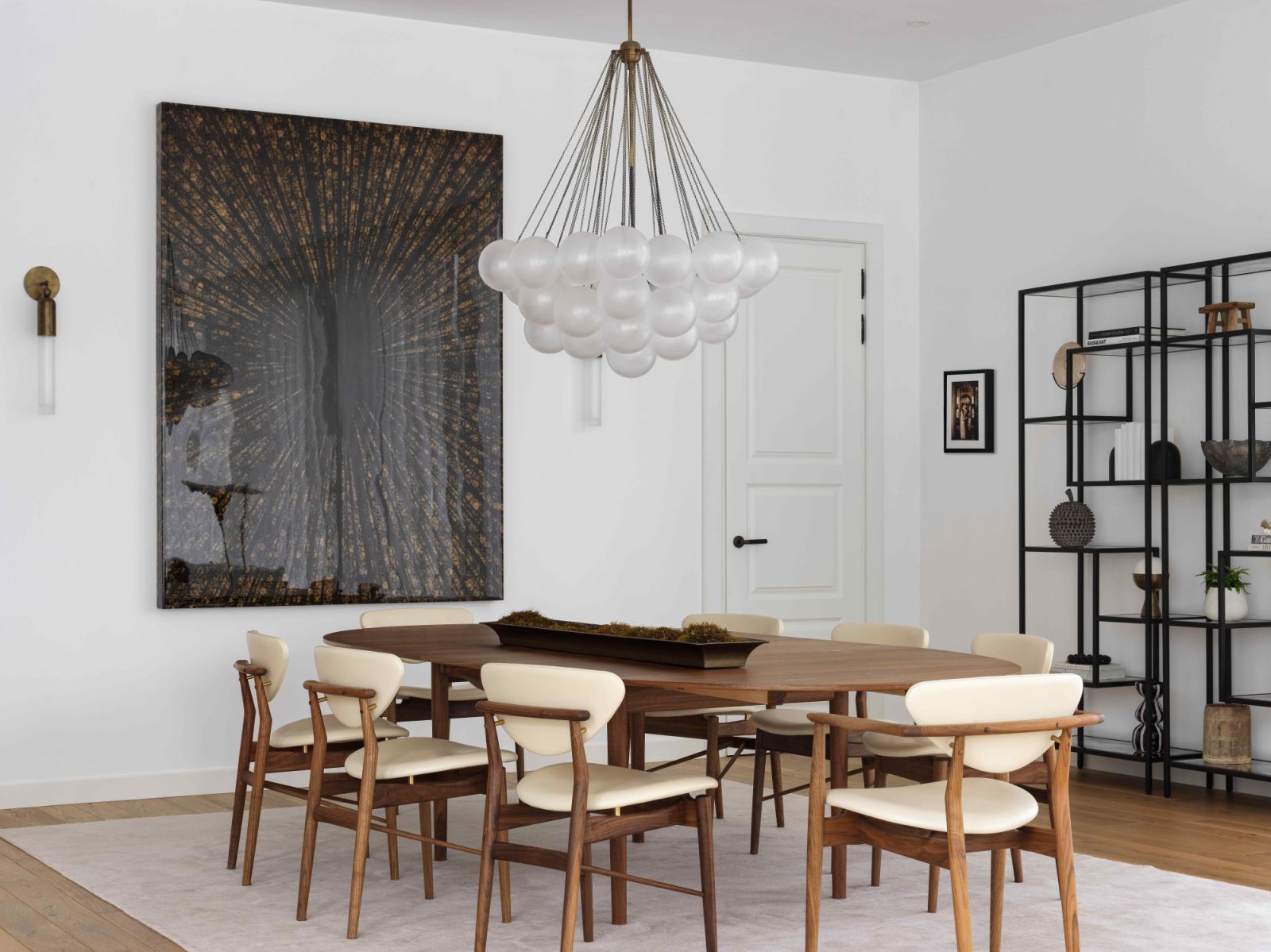 The light-filled dining area with tasteful decors next to the living room