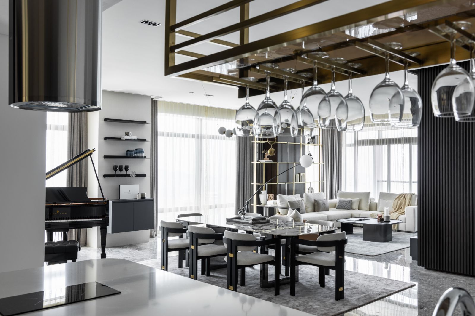 The seamless flow between bar and living area exemplifies modern luxury living