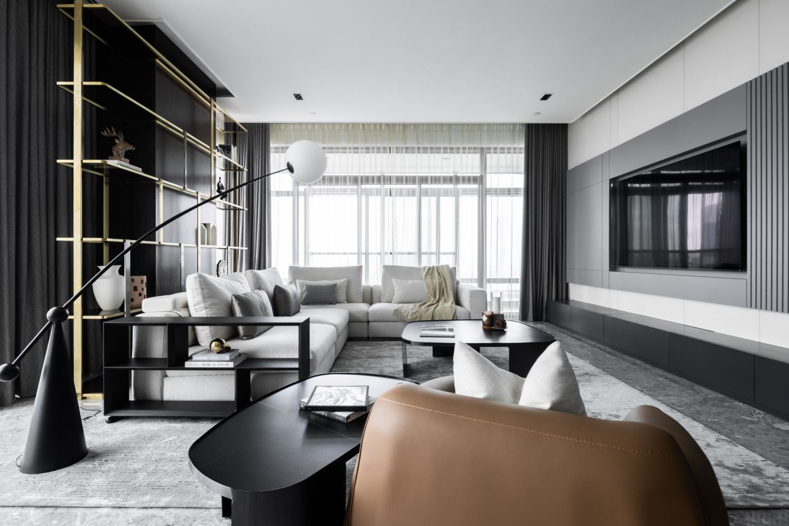 Custom shelving with brass inlays echoes Manhattan's architectural aesthetic
