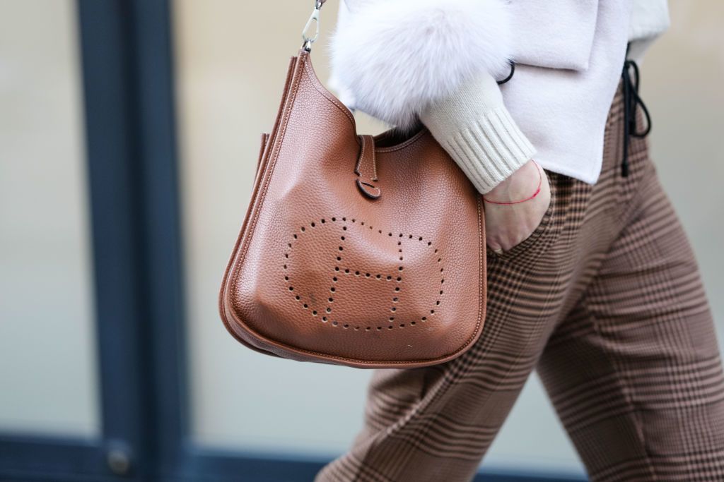 NEW YORK, NEW YORK - FEBRUARY 07: A guest wears light brown leather bag from Hermes, outside FFORME, during the New York Fashion week Fall/Winter 2025 on February 7, 2025 in New York, New York. (Photo by Edward Berthelot/Getty Images)