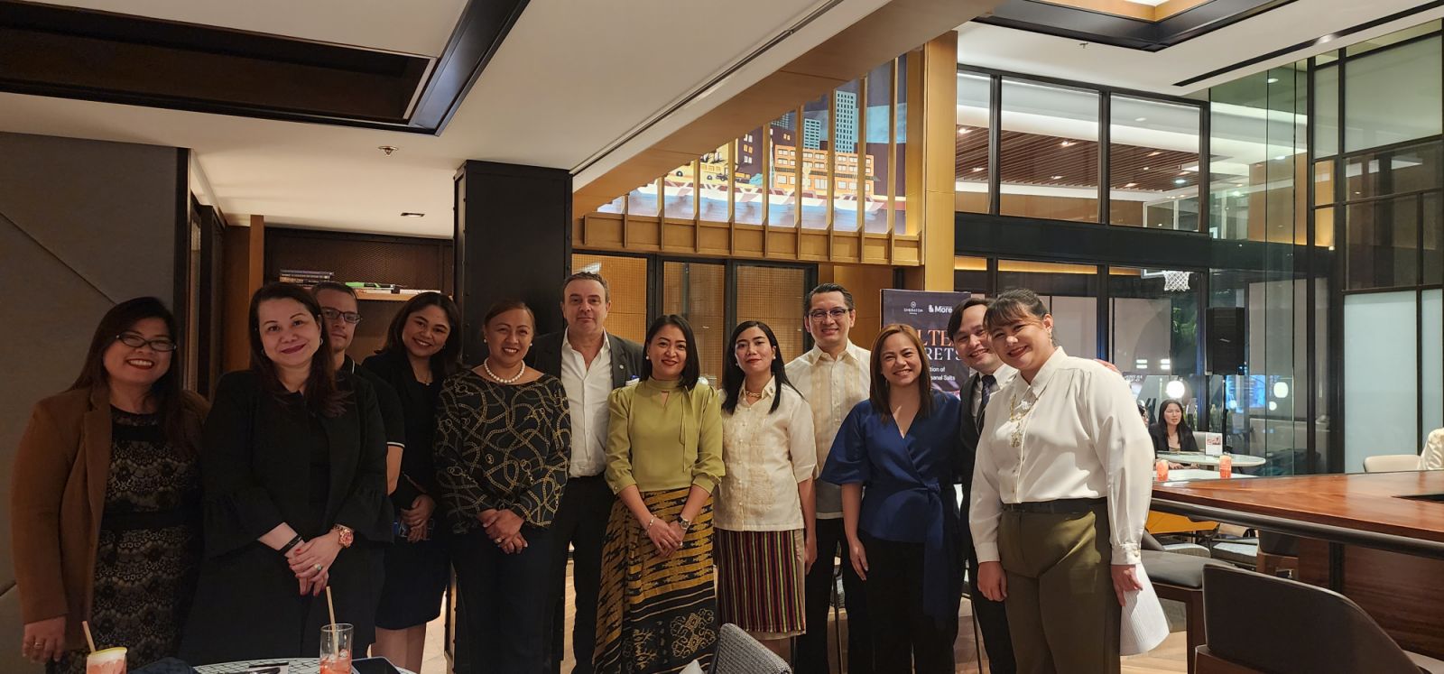Dean Kathleen Apilado with the chefs and managerial team of Sheraton Hotel, displaying Filipino artisanal sea salt