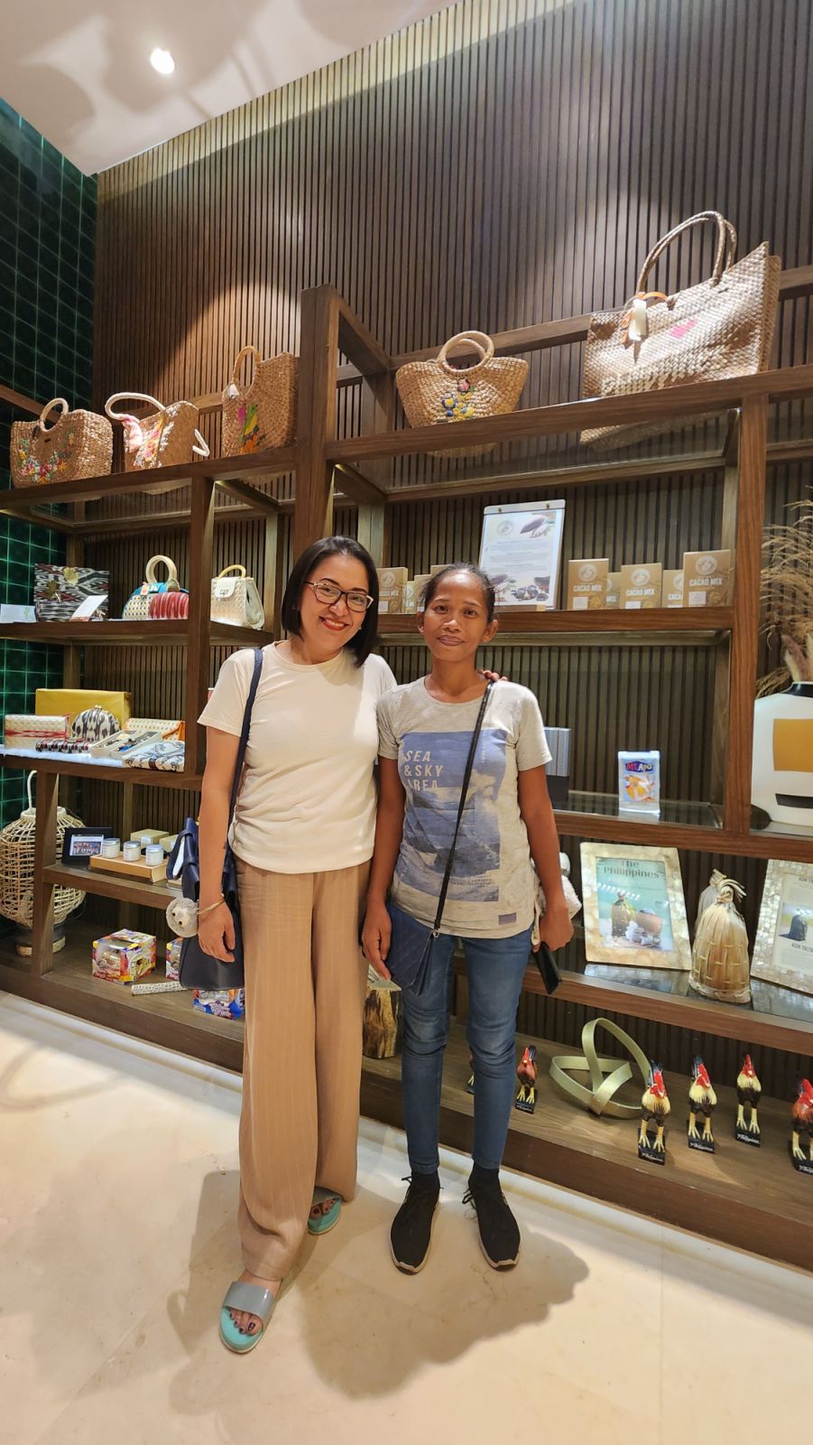 Kathleen Apilado with a Filipina sea salt farmer