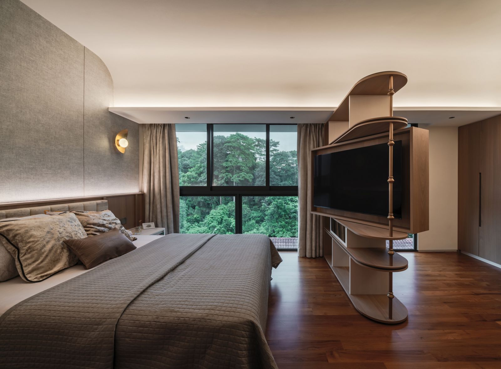 The master bedroom features a unique shelving partition separating the sleeping area and the study