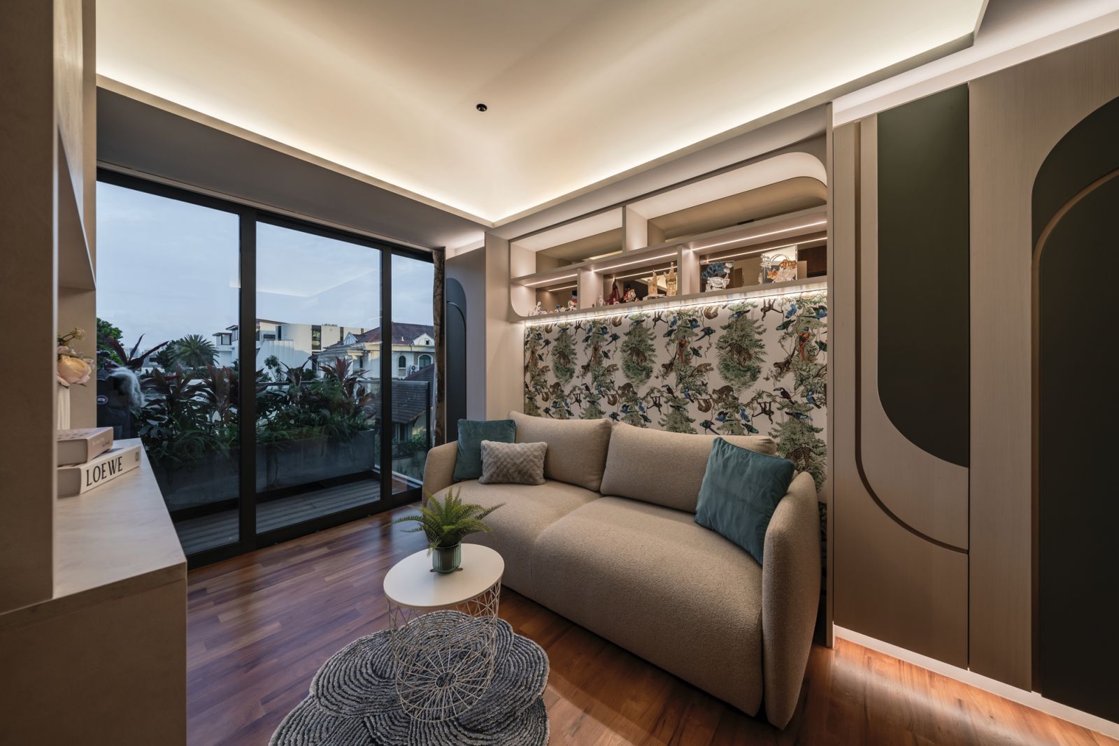 Botanical touches and neutral hues create a cosy ambience in this sitting area