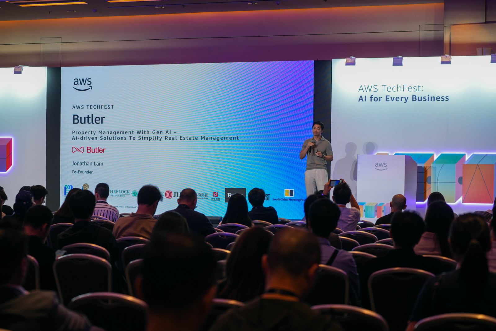 Lam shares how Butler users AI technology in its building management system at an event hosted by Amazon Web Services in 2024 (Photo: Jonathan Lam)