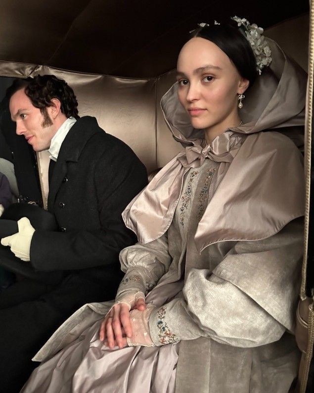 A behind-the-scenes photo of Nicholas Hoult and Lily-Rose Depp in costume as Thomas and Ellen Hutter (Photo: Instagram / @lindamuircostumedesign)