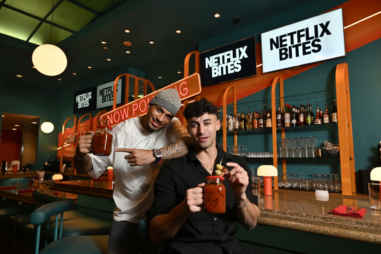 LAS VEGAS, NEVADA - FEBRUARY 10: (L-R) Louis Russell and Isaac Francis attend Netflix BITES Vegas press preview event on February 10, 2025 in Las Vegas, Nevada. (Photo by David Becker/Getty Images for Netflix)