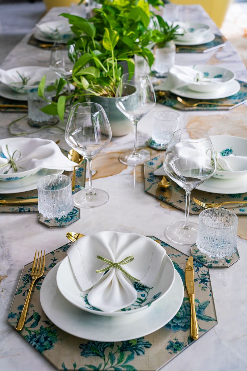 An impeccable table setting reinforces the biophilic feel