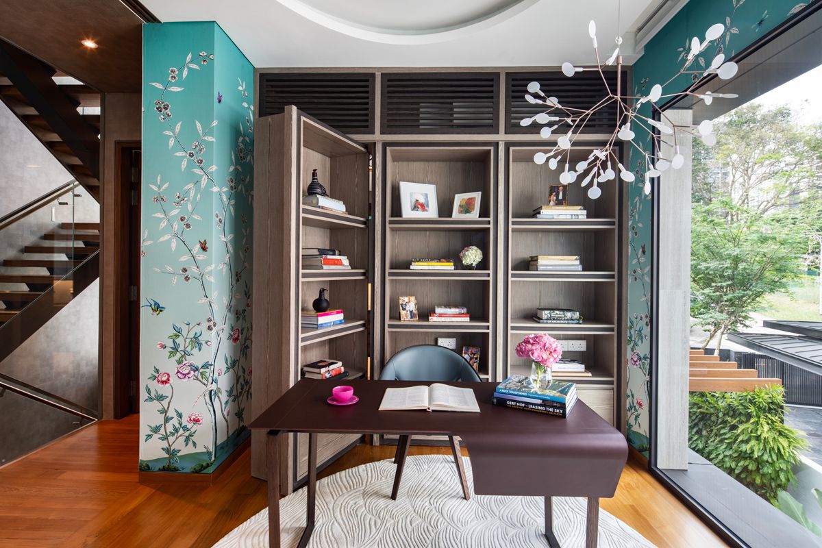 The wife's study enjoys plentiful natural light that highlights its floral theme