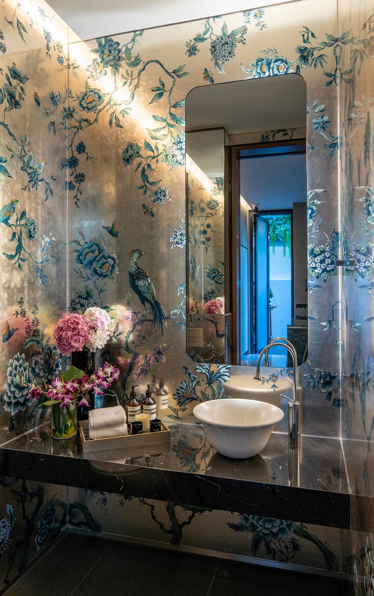 This petite powder room is a secret sparkling gem within the home