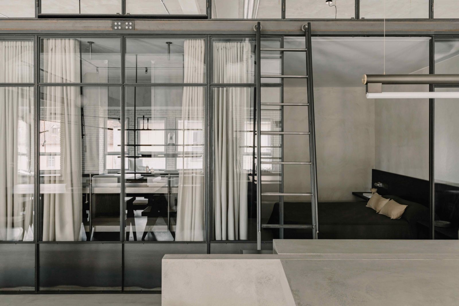 Elegant heavy curtains ensure privacy in the bedroom and bathroom