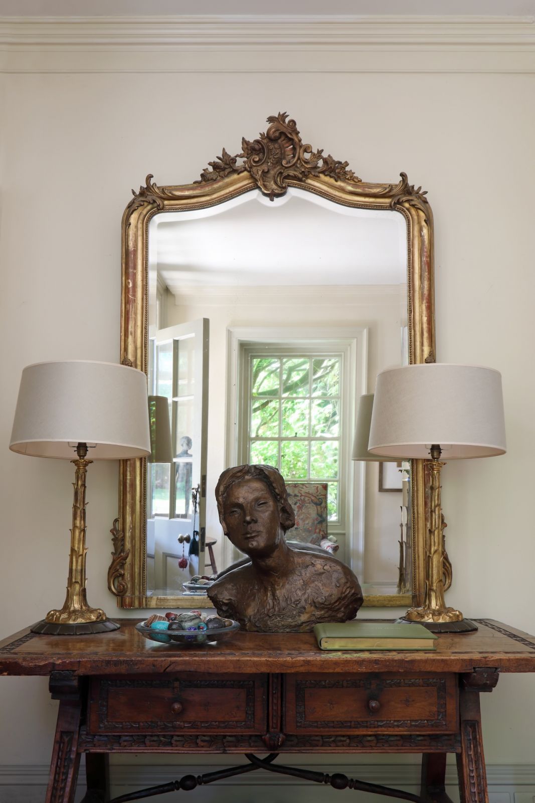 An antique mirror in the entryway of a Sussex, England home