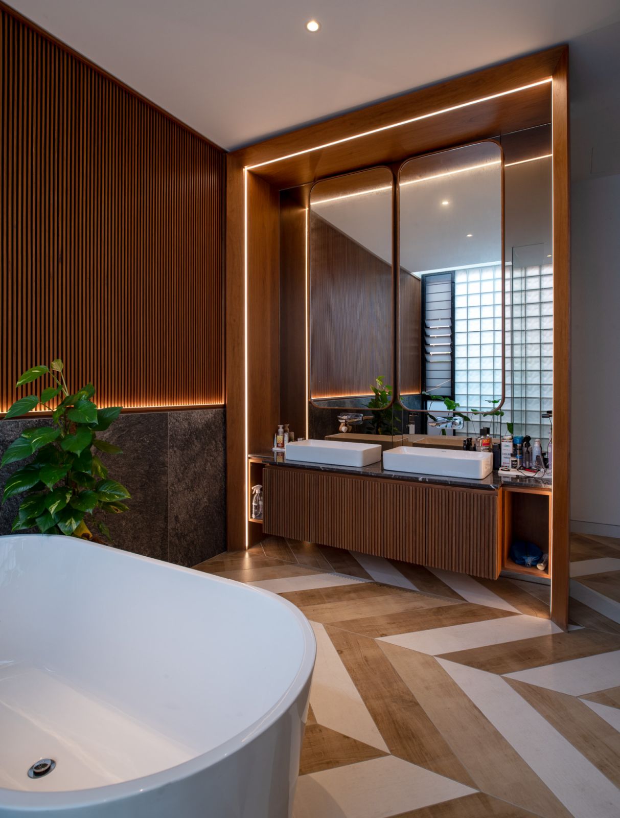The warm palette extends to the bathroom