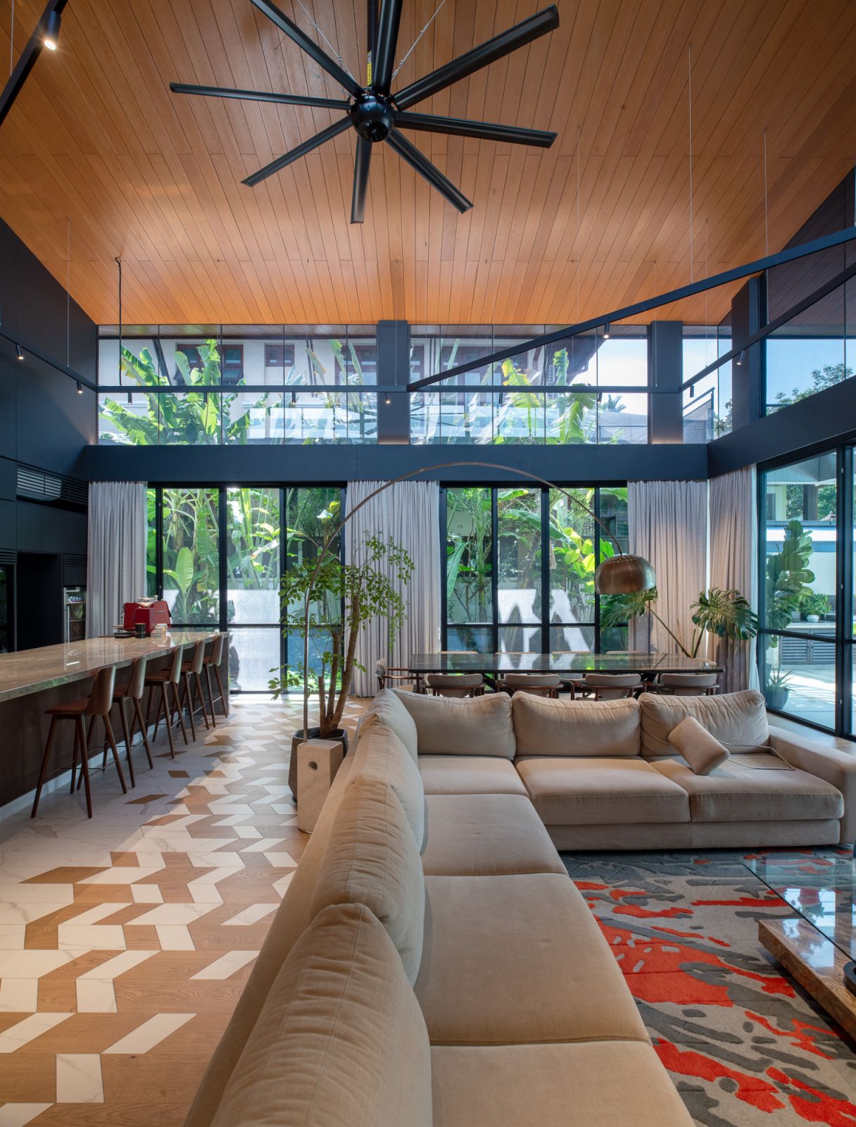 The sloping roof soars above the living room