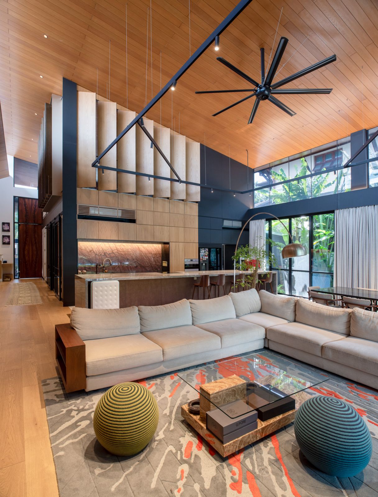 The sloping roof soars above the living room