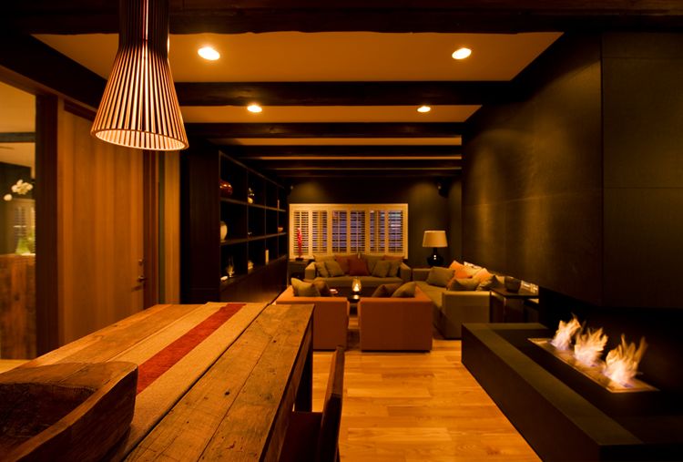 Scandinavian-style slatted lampshades hanging from the wood-beamed ceiling (Photo: Design Hotels)