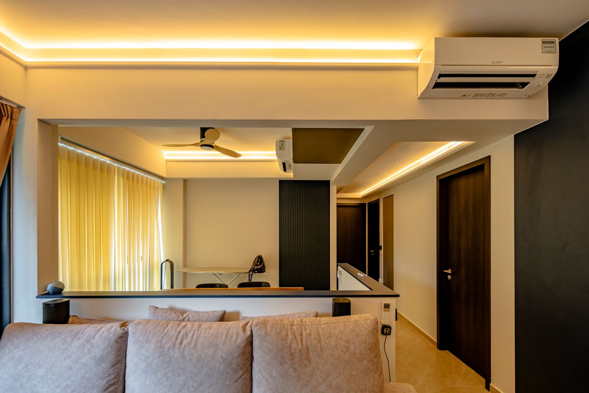 The lighting strips demarcate the transition between the living and dining areas