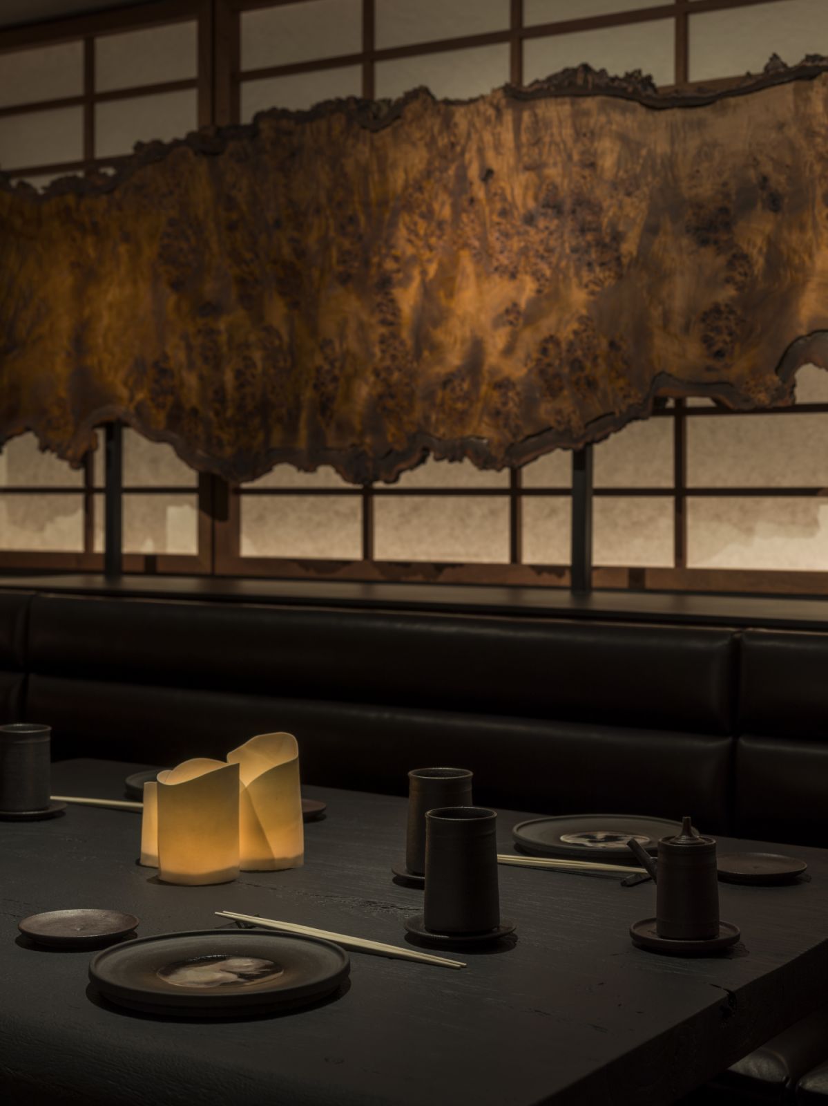 Dark details and crafted pieces add to the arty yet austere atmosphere (Photo: Saint Laurent)
