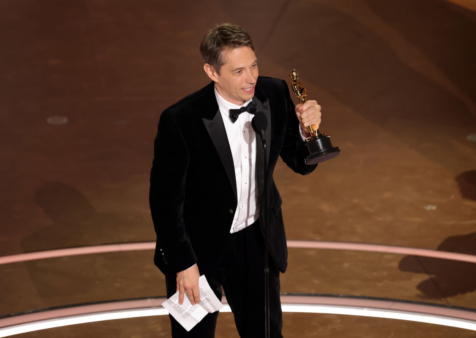 HOLLYWOOD, CALIFORNIA - MARCH 02: Sean Baker accepts the Directing award for "Anora" onstage during the 97th Annual Oscars at Dolby Theatre on March 02, 2025 in Hollywood, California. (Photo by Kevin Winter/Getty Images)