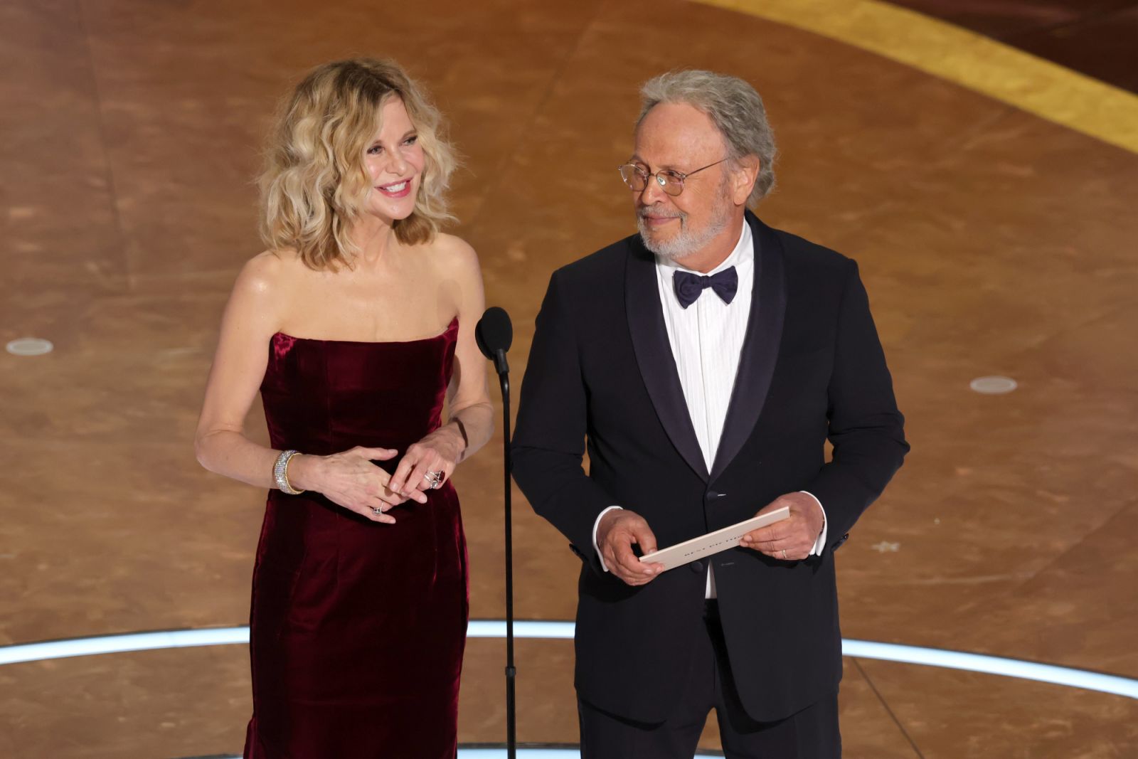 Meg Ryan and Billy Crystal speak onstage for the Oscars 2025 (Photo: Getty Images)