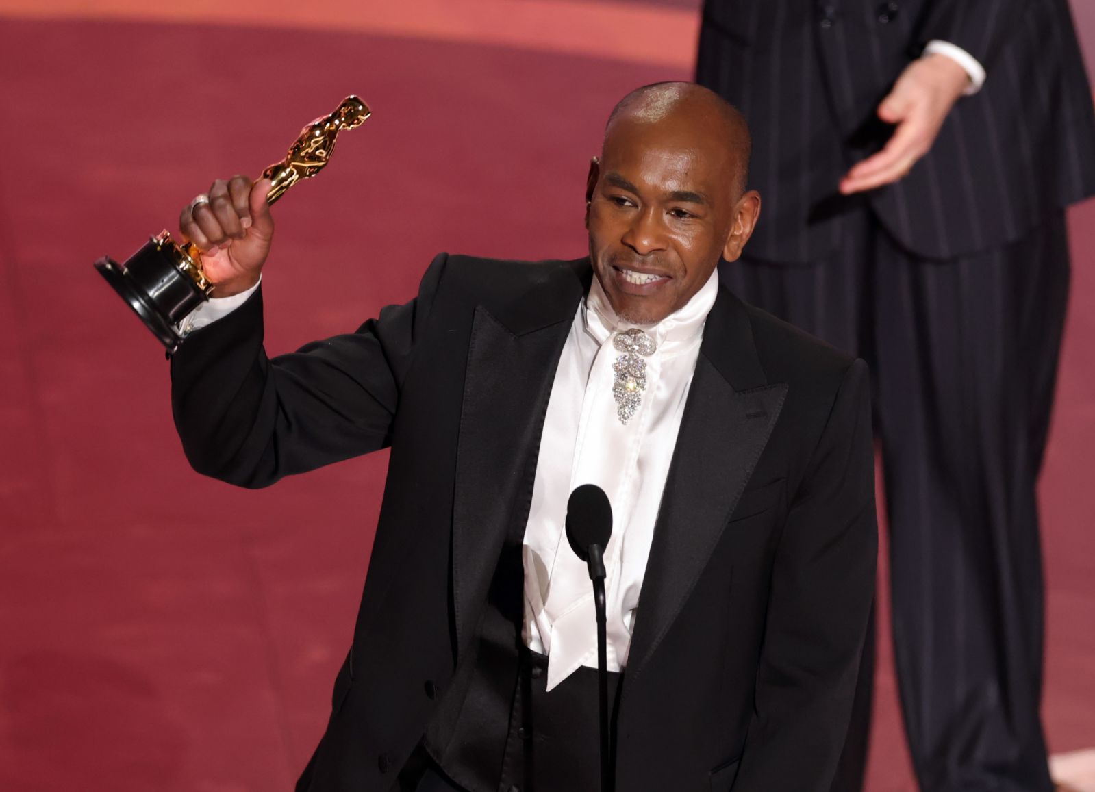 Paul Tazewell accepts the Costume Design award for "Wicked" onstage during Oscars 2025 (Photo: Getty Images)
