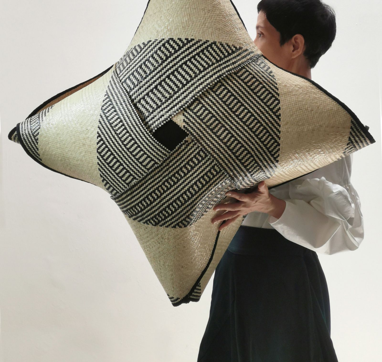 Ketupat is a series of rattan-made low seating