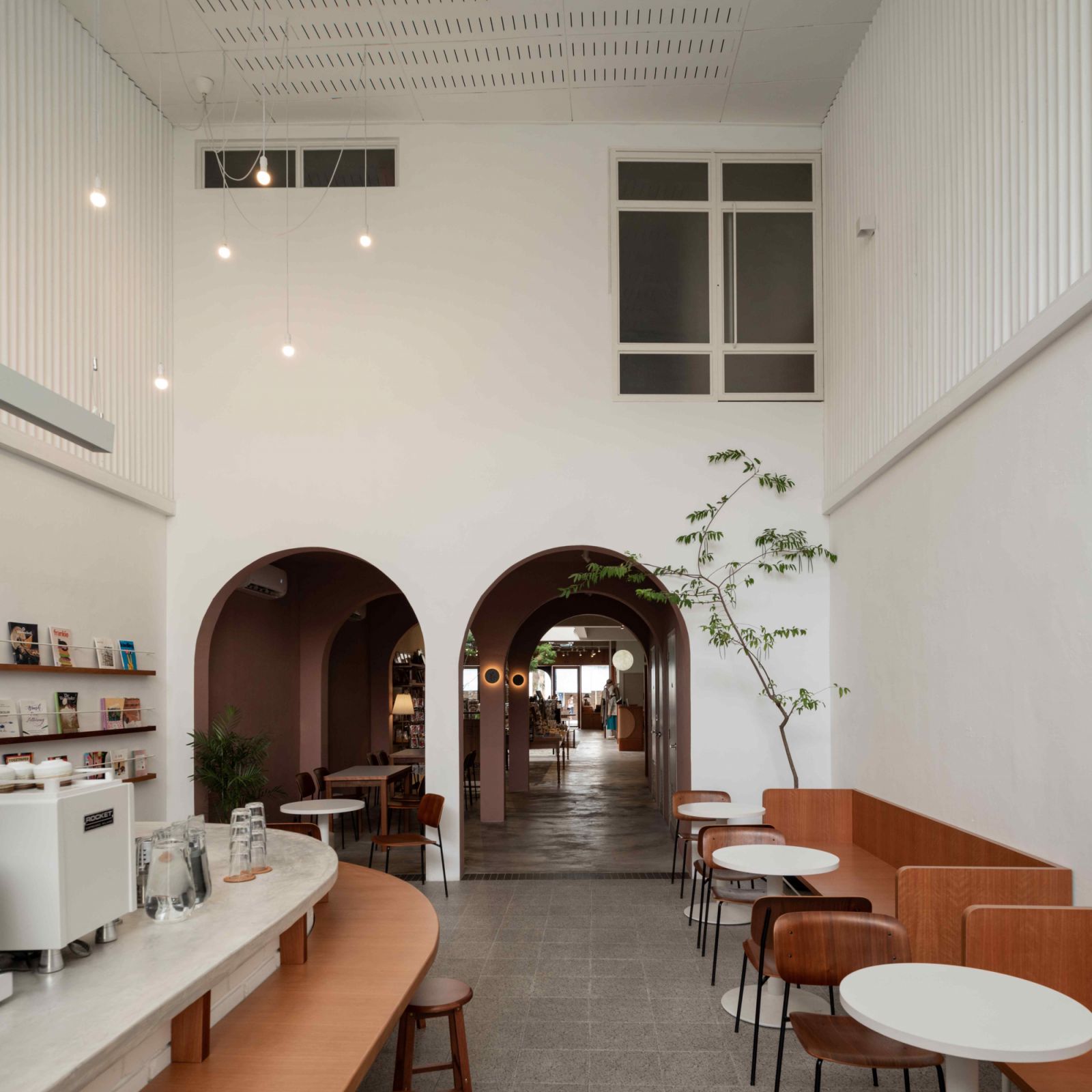The airy cafe space toward the rear of the property