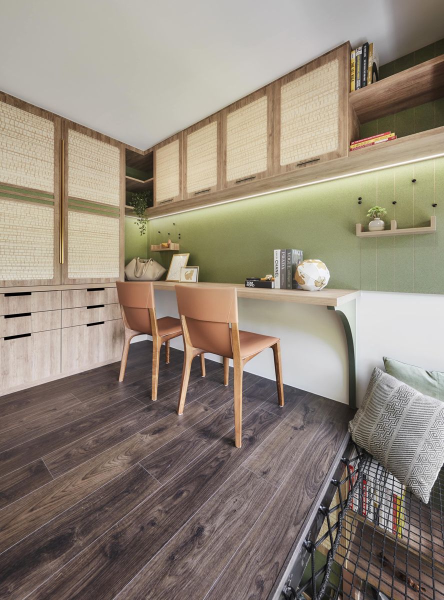 The green accent in the Upper Bukit Timah home's study lends a biophilic touch