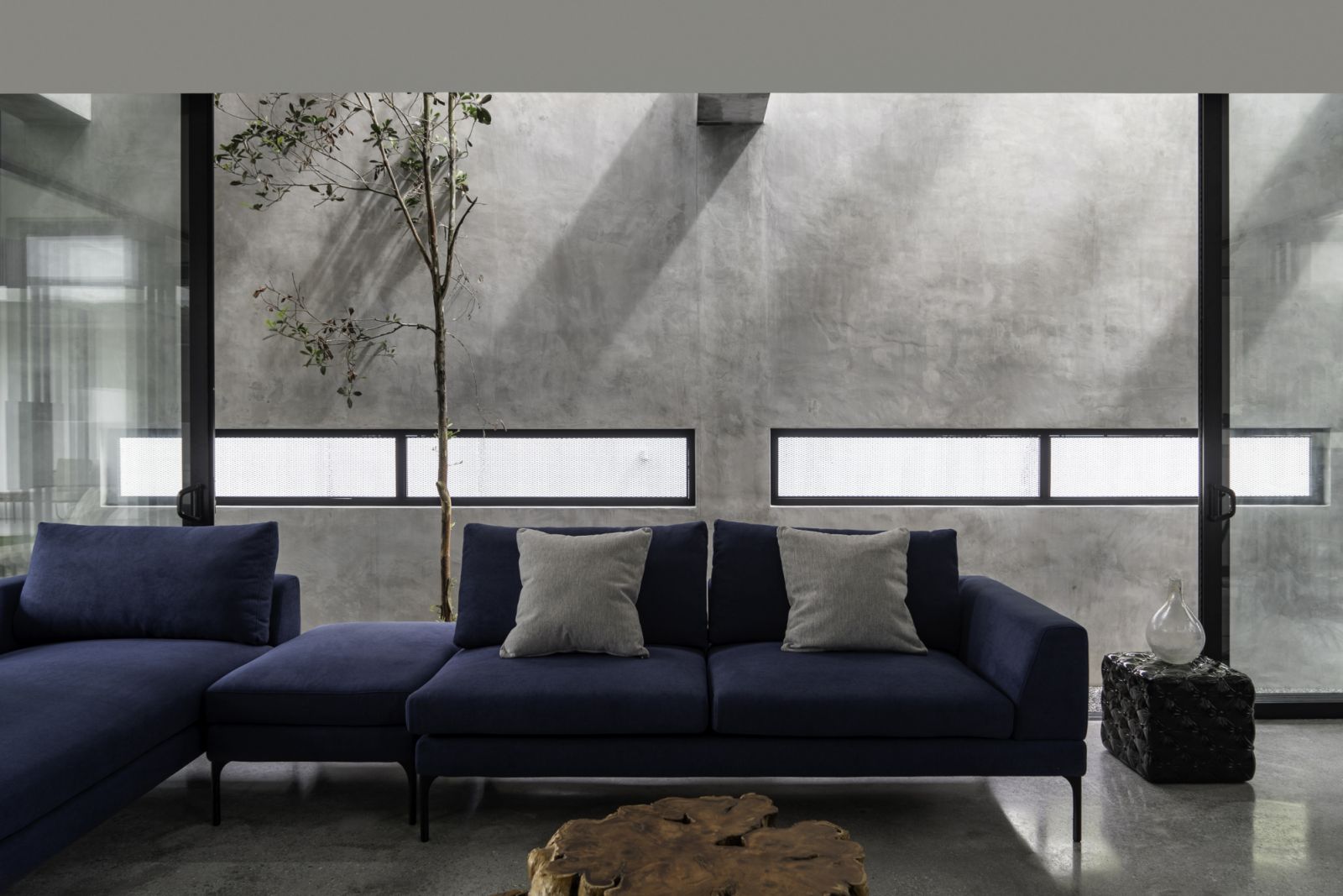 This home blends contemporary design with natural elements to create spaces that feel both refined and grounded