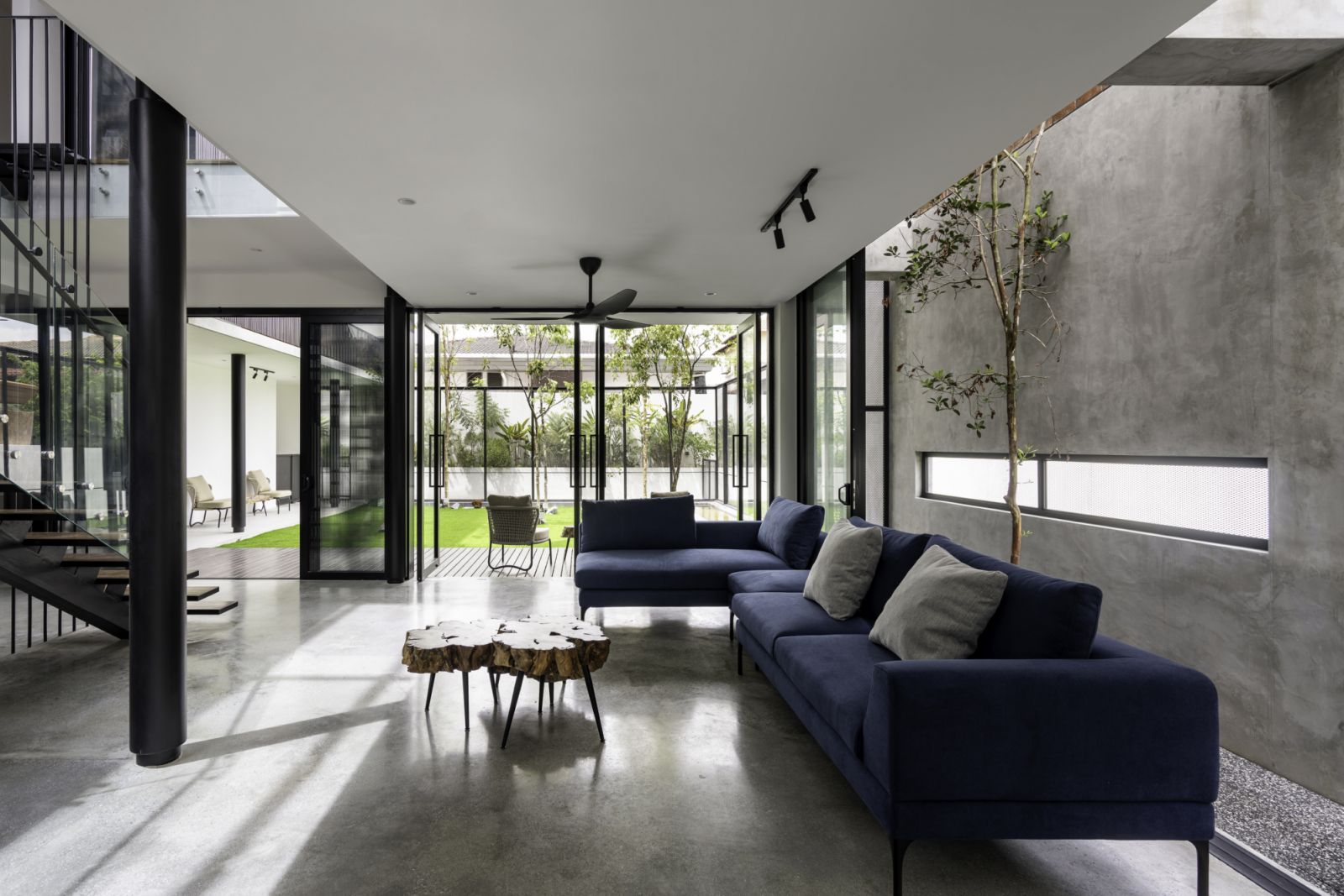 The main living area reveals the heart of the Interlace House’s open-plan design