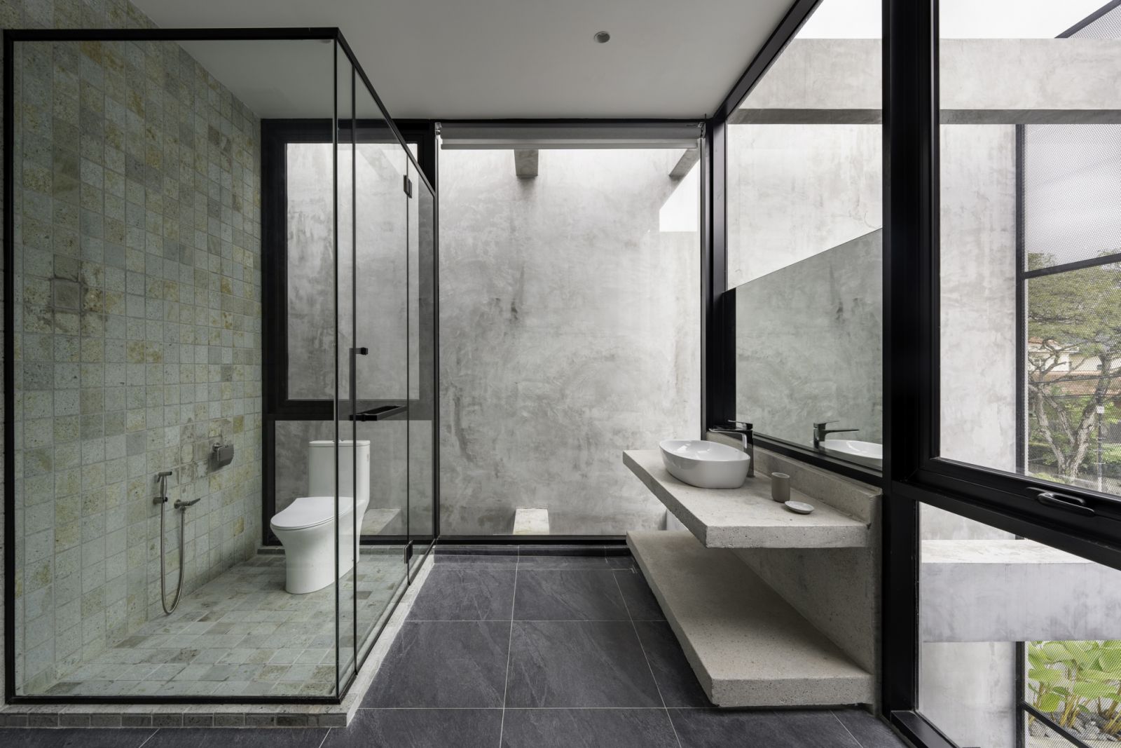 The master bathroom is a sophisticated balance of openness and privacy
