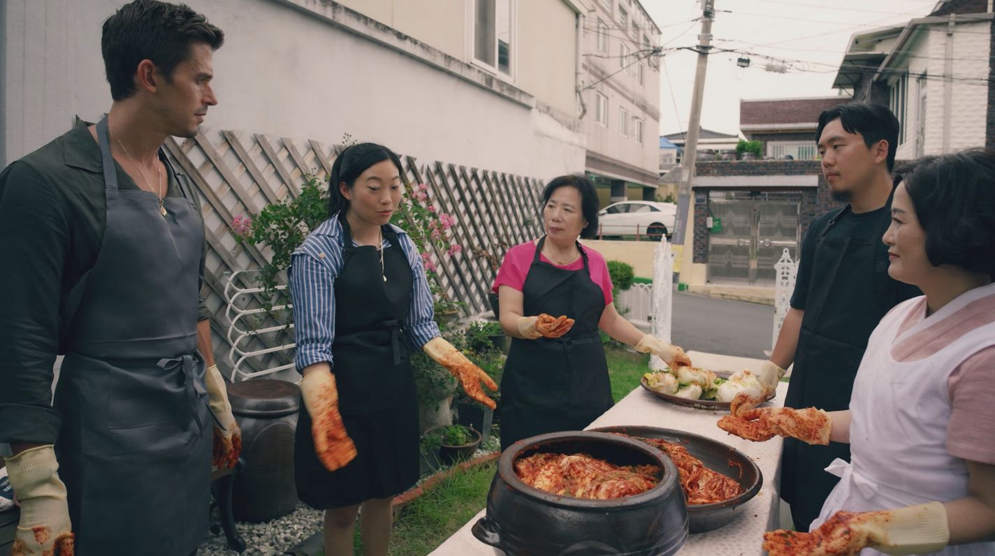 Antoni Porowski, Awkwafina, Insook Kim, Junho Lee and Shin Aga make kimchi, which is normally a Korean tradition passed from mother to daughter. (Image: National Geographic)